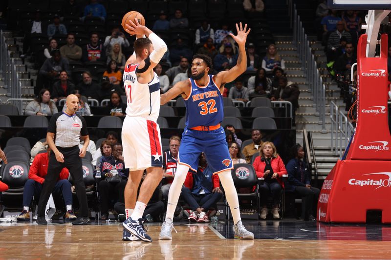 WASHINGTON, DC -? OCTOBER 18: Karl-Anthony Towns #32 of the New York Knicks plays defense during the game against the Washington Wizards on October 18, 2024 at Capital One Arena in Washington, DC. NOTE TO USER: User expressly acknowledges and agrees that, by downloading and or using this Photograph, user is consenting to the terms and conditions of the Getty Images License Agreement. Mandatory Copyright Notice: Copyright 2024 NBAE (Photo by Kenny Giarla/NBAE via Getty Images)