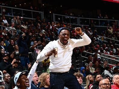 ATLANTA, GA - DECEMBER 18: Boosie celebrates during the game on December 18, 2023 at State Farm Arena in Atlanta, Georgia.  NOTE TO USER: User expressly acknowledges and agrees that, by downloading and/or using this Photograph, user is consenting to the terms and conditions of the Getty Images License Agreement. Mandatory Copyright Notice: Copyright 2023 NBAE (Photo by Scott Cunningham/NBAE via Getty Images)