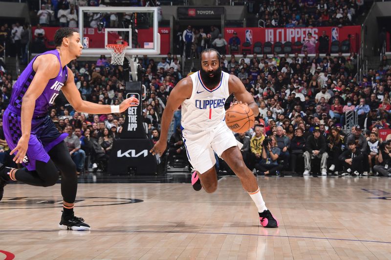 LOS ANGELES, CA - FEBRUARY 25: James Harden #1 of the LA Clippers dribbles the ball during the game against the Sacramento Kings on February 25, 2024 at Crypto.Com Arena in Los Angeles, California. NOTE TO USER: User expressly acknowledges and agrees that, by downloading and/or using this Photograph, user is consenting to the terms and conditions of the Getty Images License Agreement. Mandatory Copyright Notice: Copyright 2024 NBAE (Photo by Adam Pantozzi/NBAE via Getty Images)