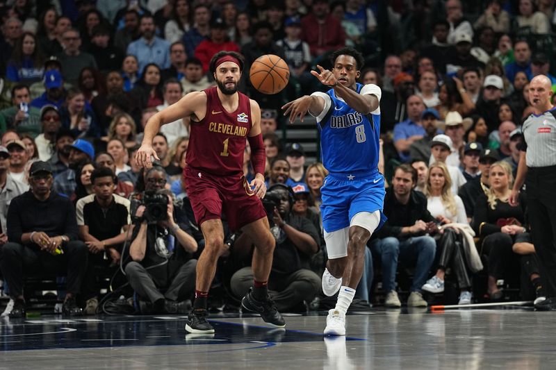 DALLAS, TX - JANUARY 03:  Olivier Maxence-Prosper #8 of the Dallas Mavericks passes the ball during the game against the Cleveland Cavaliers on January 3, 2025 at American Airlines Center in Dallas, Texas. NOTE TO USER: User expressly acknowledges and agrees that, by downloading and or using this photograph, User is consenting to the terms and conditions of the Getty Images License Agreement. Mandatory Copyright Notice: Copyright 2025 NBAE (Photo by Glenn James/NBAE via Getty Images)