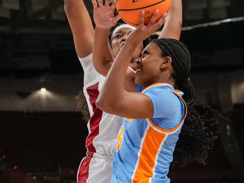 Mar 8, 2024; Greensville, SC, USA; Tennessee Lady Vols guard Kaiya Wynn (5) shoots against Alabama Crimson Tide forward Essence Cody (21) during the second half at Bon Secours Wellness Arena. Mandatory Credit: Jim Dedmon-USA TODAY Sports