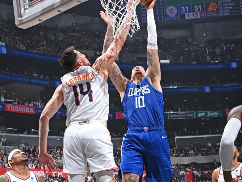 LOS ANGELES, CA - JANUARY 8: Daniel Theis #10 of the LA Clippers drives to the basket during the game against the Phoenix Suns on January 8, 2024 at Crypto.Com Arena in Los Angeles, California. NOTE TO USER: User expressly acknowledges and agrees that, by downloading and/or using this Photograph, user is consenting to the terms and conditions of the Getty Images License Agreement. Mandatory Copyright Notice: Copyright 2024 NBAE (Photo by Andrew D. Bernstein/NBAE via Getty Images)