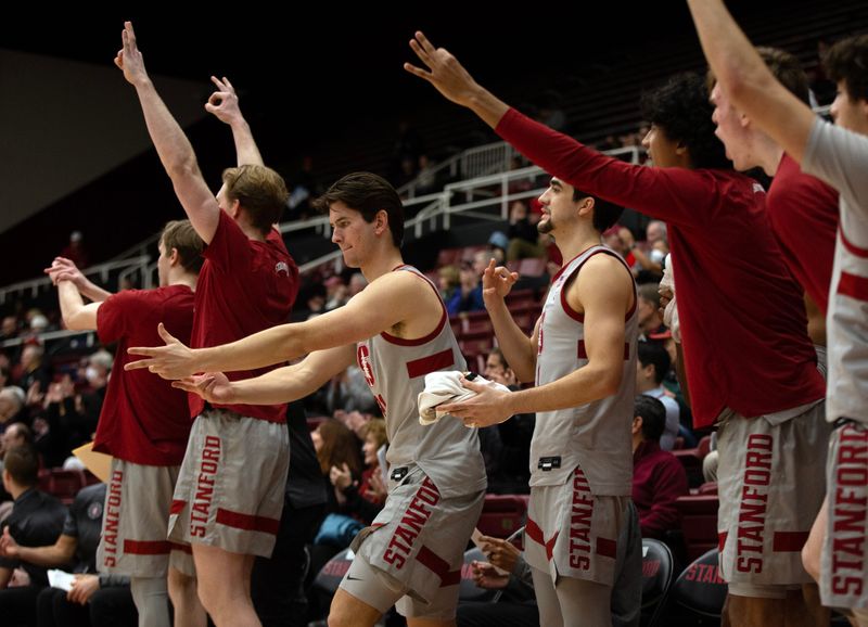 Jan 19, 2023; Stanford, California, USA; The Stanford Cardinal bench celebrates a 3-point basket against the Oregon State Beavers during the first half at Maples Pavilion. Mandatory Credit: D. Ross Cameron-USA TODAY Sports