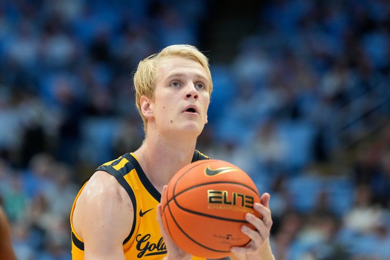 Jan 15, 2025; Chapel Hill, North Carolina, USA; California Golden Bears forward Rytis Petraitis (31) on the free throw line in the first half at Dean E. Smith Center. Mandatory Credit: Bob Donnan-Imagn Images