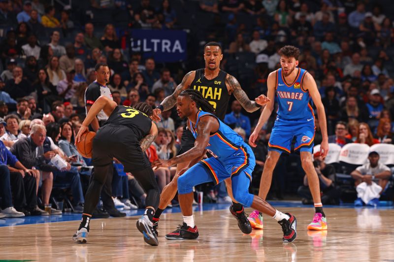 OKLAHOMA CITY, OK - MARCH 20: Cason Wallace #22 of the Oklahoma City Thunder  plays defense during the game against the Utah Jazz on March 20, 2024 at Paycom Arena in Oklahoma City, Oklahoma. NOTE TO USER: User expressly acknowledges and agrees that, by downloading and or using this photograph, User is consenting to the terms and conditions of the Getty Images License Agreement. Mandatory Copyright Notice: Copyright 2024 NBAE (Photo by Zach Beeker/NBAE via Getty Images)