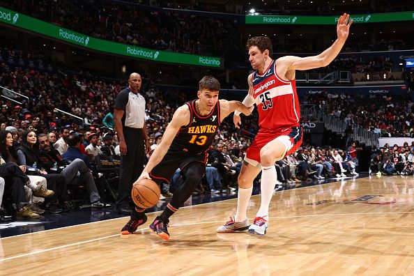 WASHINGTON, DC -? DECEMBER 31: Bogdan Bogdanovic #13 of the Atlanta Hawks drives to the basket during the game against the Washington Wizards on December 31, 2023 at Capital One Arena in Washington, DC. NOTE TO USER: User expressly acknowledges and agrees that, by downloading and or using this Photograph, user is consenting to the terms and conditions of the Getty Images License Agreement. Mandatory Copyright Notice: Copyright 2023 NBAE (Photo by Kenny Giarla/NBAE via Getty Images)