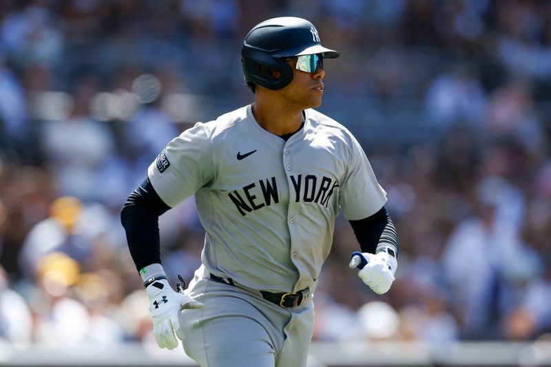 May 26, 2024; San Diego, California, USA; New York Yankees right fielder Juan Soto (22) runs down the first base line after hitting a rbi double in the sixth inning against the San Diego Padres  at Petco Park. Mandatory Credit: David Frerker-USA TODAY Sports