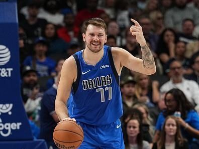 DALLAS, TX - NOVEMBER 5: Luka Doncic #77 of the Dallas Mavericks smiles during the game against the Charlotte Hornets on November 5, 2023 at the American Airlines Center in Dallas, Texas. NOTE TO USER: User expressly acknowledges and agrees that, by downloading and or using this photograph, User is consenting to the terms and conditions of the Getty Images License Agreement. Mandatory Copyright Notice: Copyright 2023 NBAE (Photo by Glenn James/NBAE via Getty Images)