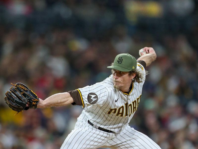 May 20, 2023; San Diego, California, USA; San Diego Padres relief pitcher Tim Hill (25) throws a pitch in the seventh inning against the Boston Red Sox at Petco Park. Mandatory Credit: David Frerker-USA TODAY Sports