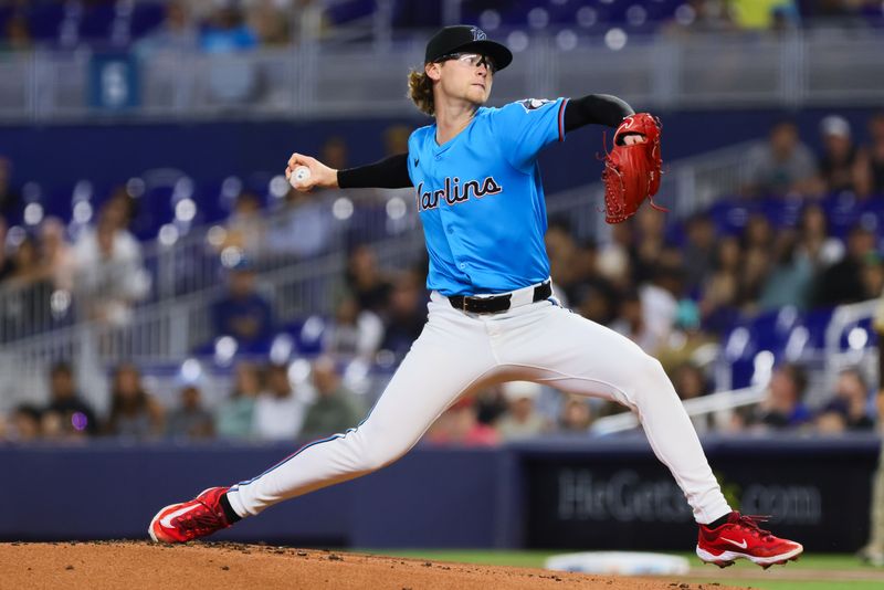 Aug 11, 2024; Miami, Florida, USA; Miami Marlins starting pitcher Max Meyer (23) delivers a pitch against the San Diego Padres during the first inning at loanDepot Park. Mandatory Credit: Sam Navarro-USA TODAY Sports