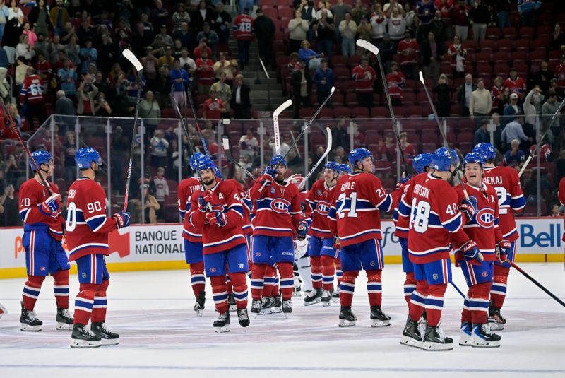 Sep 23, 2025; Montreal, Quebec, CAN; The Montreal Canadiens celebrates a win against the Philadelphia Flyers at the Bell Centre. Mandatory Credit: Eric Bolte-Imagn Images
