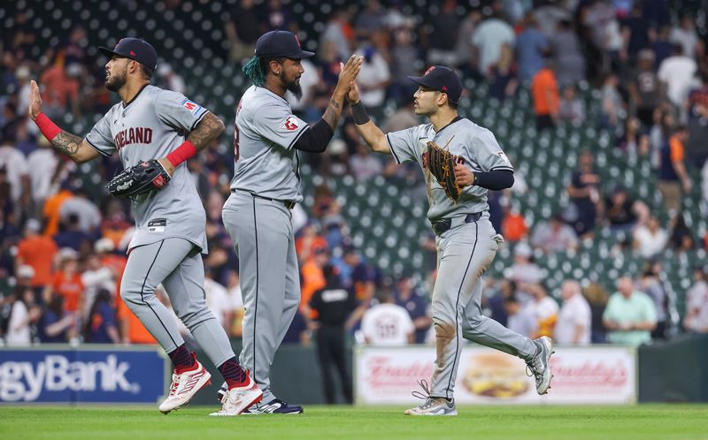 May 1, 2024; Houston, Texas, USA;  Cleveland Guardians left fielder Steven Kwan (38) celebrates with relief pitcher Emmanuel Clase (48) after the game against the Houston Astros at Minute Maid Park. Mandatory Credit: Troy Taormina-USA TODAY Sports