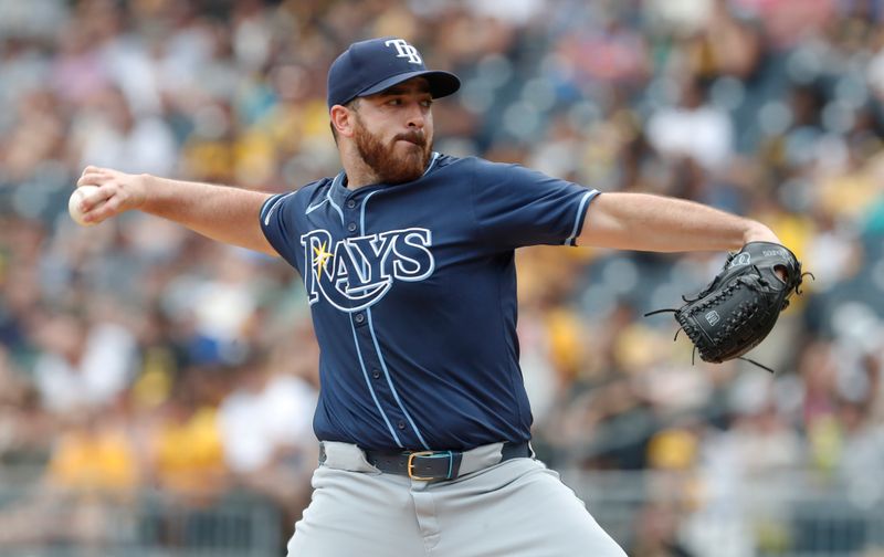 Jun 23, 2024; Pittsburgh, Pennsylvania, USA;  Tampa Bay Rays starting pitcher Aaron Civale (34) delivers a pitch against the Pittsburgh Pirates during the first inning at PNC Park. Mandatory Credit: Charles LeClaire-USA TODAY Sports