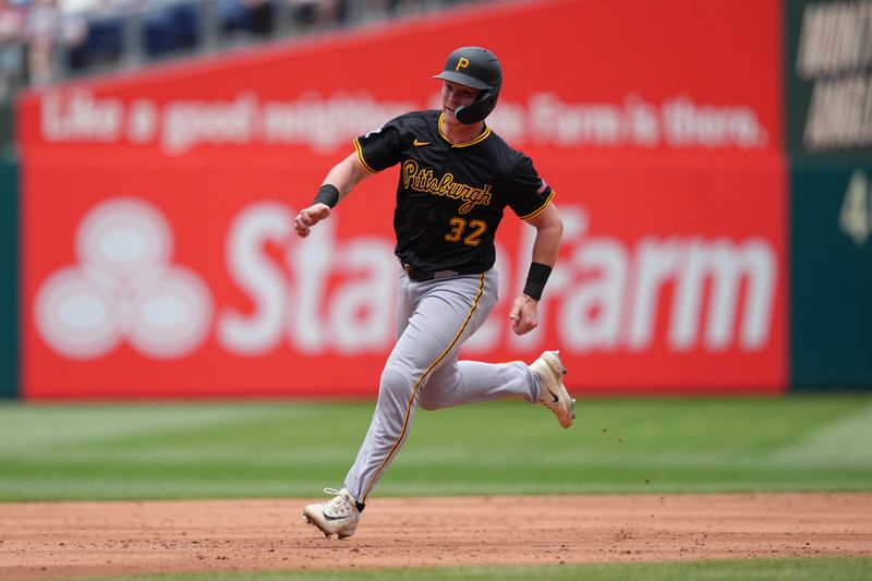 May 18, 2025; Philadelphia, Pennsylvania, USA; Pittsburgh Pirates catcher Henry Davis (32) advances to third against the Philadelphia Phillies in the third inning at Citizens Bank Park. Mandatory Credit: Kyle Ross-Imagn Images