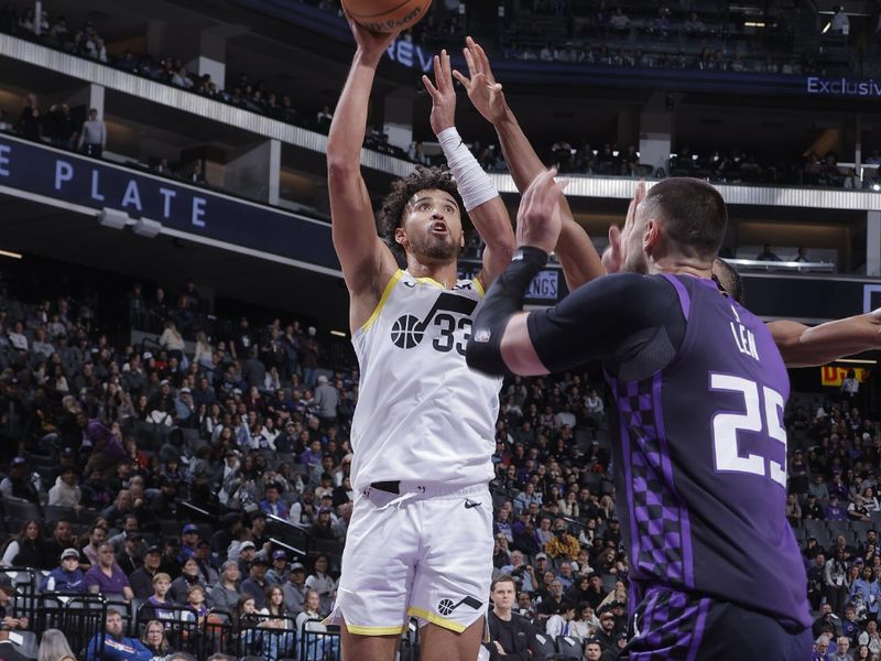 SACRAMENTO, CA - DECEMBER 8: Johnny Juzang #33 of the Utah Jazz shoots the ball during the game against the Sacramento Kings on December 8, 2024 at Golden 1 Center in Sacramento, California. NOTE TO USER: User expressly acknowledges and agrees that, by downloading and or using this Photograph, user is consenting to the terms and conditions of the Getty Images License Agreement. Mandatory Copyright Notice: Copyright 2024 NBAE (Photo by Rocky Widner/NBAE via Getty Images)