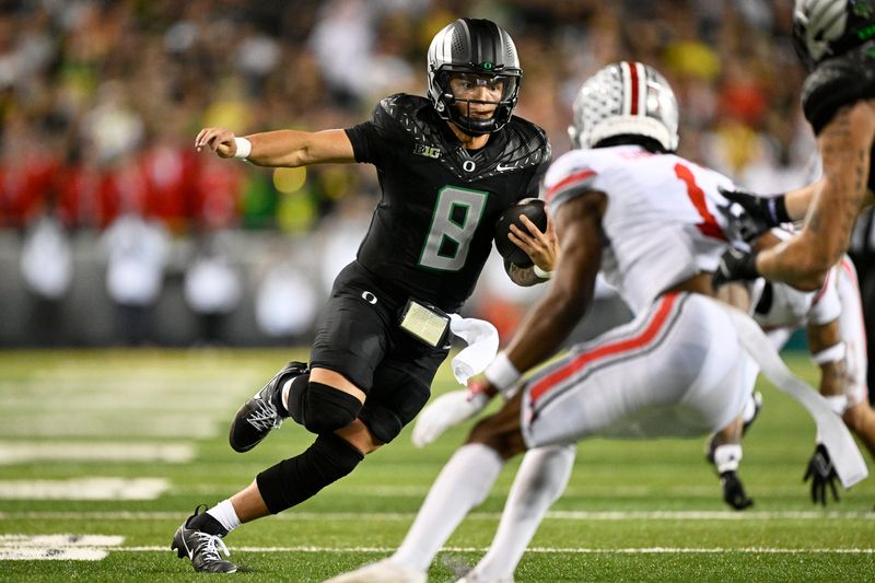 Oct 12, 2024; Eugene, Oregon, USA; Oregon Ducks quarterback Dillon Gabriel (8) carries the ball for a touchdown during the second half against the Ohio State Buckeyes at Autzen Stadium. Mandatory Credit: Troy Wayrynen-Imagn Images