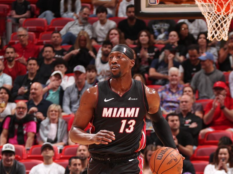 MIAMI, FL - MARCH 24: Bam Adebayo #13 of the Miami Heat brings the ball up court during the game against the Cleveland Cavaliers on March 24, 2024 at Kaseya Center in Miami, Florida. NOTE TO USER: User expressly acknowledges and agrees that, by downloading and or using this Photograph, user is consenting to the terms and conditions of the Getty Images License Agreement. Mandatory Copyright Notice: Copyright 2024 NBAE (Photo by Issac Baldizon/NBAE via Getty Images)