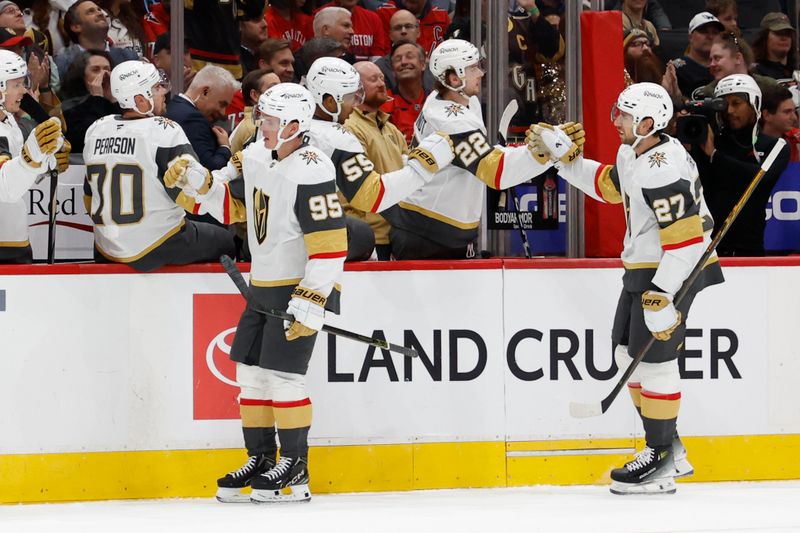 Oct 15, 2024; Washington, District of Columbia, USA; Vegas Golden Knights right wing Victor Olofsson (95) celebrates with teammates after scoring a goal against the Washington Capitals in the first period at Capital One Arena. Mandatory Credit: Geoff Burke-Imagn Images