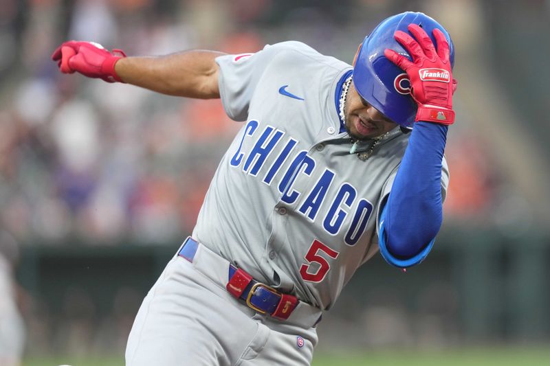 Jul 10, 2024; Baltimore, Maryland, USA; Chicago Cubs third baseman Christopher Morel (5) rounds the bases following his solo home run in the first inning against the Baltimore Orioles at Oriole Park at Camden Yards. Mandatory Credit: Mitch Stringer-USA TODAY Sports
