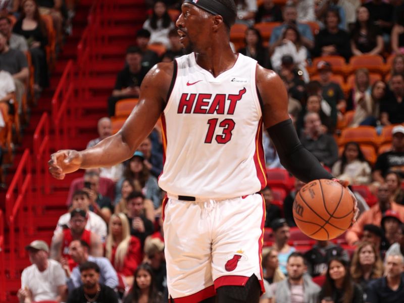 MIAMI, FL - MARCH 29: Bam Adebayo #13 of the Miami Heat dribbles the ball during the game against the Portland Trail Blazers on March 29, 2024 at Kaseya Center in Miami, Florida. NOTE TO USER: User expressly acknowledges and agrees that, by downloading and or using this Photograph, user is consenting to the terms and conditions of the Getty Images License Agreement. Mandatory Copyright Notice: Copyright 2024 NBAE (Photo by Issac Baldizon/NBAE via Getty Images)