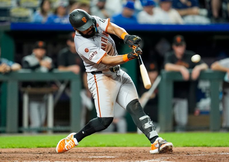 Sep 20, 2024; Kansas City, Missouri, USA; San Francisco Giants left fielder Heliot Ramos (17) hits a double during the sixth inning against the Kansas City Royals at Kauffman Stadium. Mandatory Credit: Jay Biggerstaff-Imagn Images