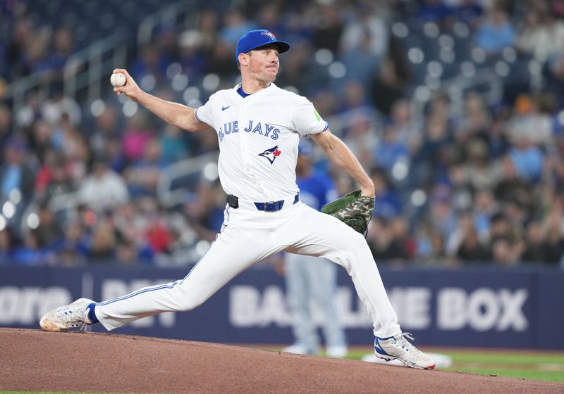 May 1, 2024; Toronto, Ontario, CAN; Toronto Blue Jays starting pitcher Chris Bassitt (40) throws a pitch against the Kansas City Royals during the first inning at Rogers Centre. Mandatory Credit: Nick Turchiaro-USA TODAY Sports