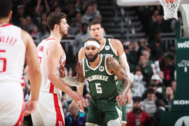 MILWAUKEE, WI - NOVEMBER 18: Gary Trent Jr. #5 of the Milwaukee Bucks defends during the game against the Houston Rockets on November 18, 2024 at the Fiserv Forum Center in Milwaukee, Wisconsin. NOTE TO USER: User expressly acknowledges and agrees that, by downloading and or using this Photograph, user is consenting to the terms and conditions of the Getty Images License Agreement. Mandatory Copyright Notice: Copyright 2024 NBAE (Photo by Gary Dineen/NBAE via Getty Images).