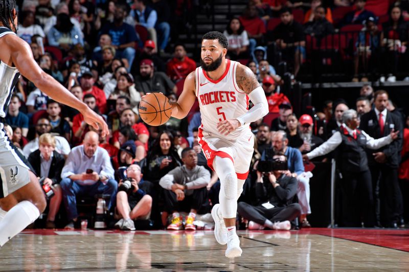 HOUSTON, TX - OCTOBER 17: Fred VanVleet #5 of the Houston Rockets brings the ball up court during the game against the San Antonio Spurs on October 17, 2024 at the Toyota Center in Houston, Texas. NOTE TO USER: User expressly acknowledges and agrees that, by downloading and or using this photograph, User is consenting to the terms and conditions of the Getty Images License Agreement. Mandatory Copyright Notice: Copyright 2024 NBAE (Photo by Logan Riely/NBAE via Getty Images)