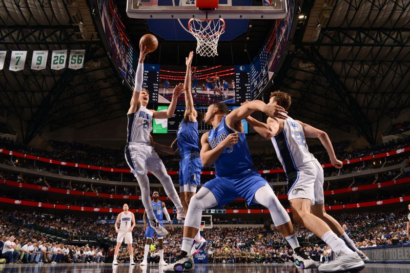 DALLAS, TX - JANUARY 29: Moritz Wagner #21 of the Orlando Magic goes to the basket during the game on January 29, 2024 at the American Airlines Center in Dallas, Texas. NOTE TO USER: User expressly acknowledges and agrees that, by downloading and or using this photograph, User is consenting to the terms and conditions of the Getty Images License Agreement. Mandatory Copyright Notice: Copyright 2024 NBAE (Photo by Glenn James/NBAE via Getty Images)