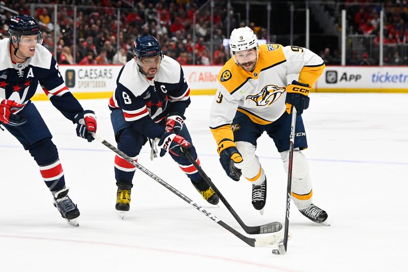 Dec 30, 2023; Washington, District of Columbia, USA; Nashville Predators left wing Filip Forsberg (9) advances the puck as Washington Capitals left wing Alex Ovechkin (8) defends during overtime at Capital One Arena. Mandatory Credit: Brad Mills-USA TODAY Sports