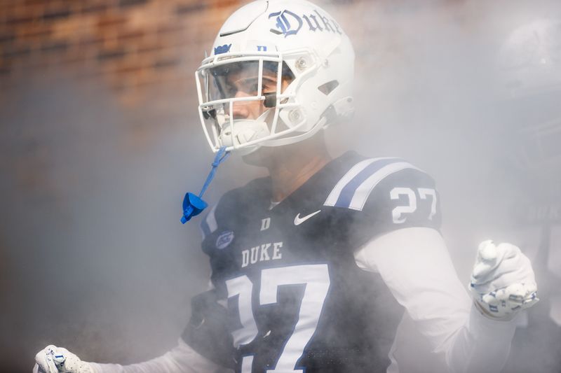 Nov 25, 2023; Durham, North Carolina, USA; Duke Blue Devils cornerback Brandon Hersh (27) runs out before the first half of the game against Pittsburgh Panthers at Wallace Wade Stadium. Mandatory Credit: Jaylynn Nash-USA TODAY Sports