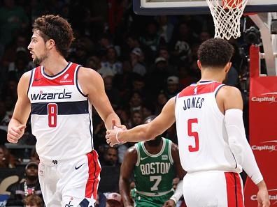 WASHINGTON, DC -? OCTOBER 30: Deni Avdija #8 and Tyus Jones #5 of the Washington Wizards high five during the game against the Boston Celtics on October 30, 2023 at Capital One Arena in Washington, DC. NOTE TO USER: User expressly acknowledges and agrees that, by downloading and or using this Photograph, user is consenting to the terms and conditions of the Getty Images License Agreement. Mandatory Copyright Notice: Copyright 2023 NBAE (Photo by Stephen Gosling/NBAE via Getty Images)