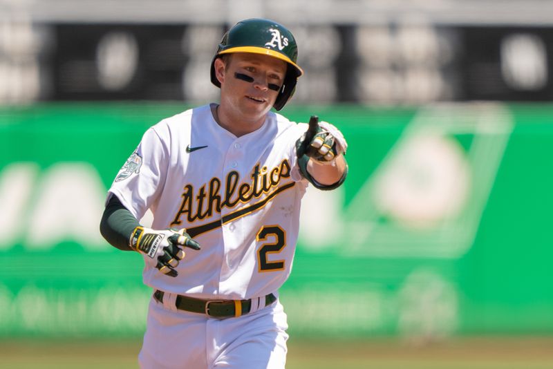 Aug 6, 2023; Oakland, California, USA;  Oakland Athletics shortstop Nick Allen (2) reacts during the second inning against the San Francisco Giants at Oakland-Alameda County Coliseum. Mandatory Credit: Stan Szeto-USA TODAY Sports