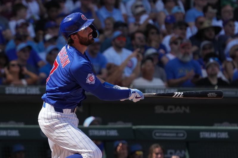 Mar 1, 2026; Mesa, Arizona, USA; Chicago Cubs shortstop Dansby Swanson (7) hits against the Chicago White Sox in the second inning at Sloan Park. Mandatory Credit: Rick Scuteri-Imagn Images