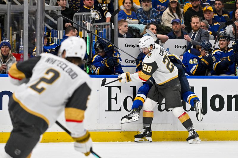 Mar 25, 2024; St. Louis, Missouri, USA;  Vegas Golden Knights left wing William Carrier (28) checks St. Louis Blues defenseman Colton Parayko (55) during the second period at Enterprise Center. Mandatory Credit: Jeff Curry-USA TODAY Sports