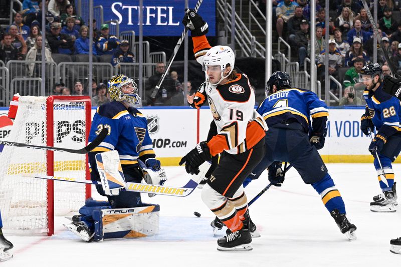 Mar 17, 2024; St. Louis, Missouri, USA; Anaheim Ducks right wing Troy Terry (19) celebrates after scoring a goal against St. Louis Blues goaltender Joel Hofer (30) during the first period at Enterprise Center. Mandatory Credit: Jeff Le-USA TODAY Sports