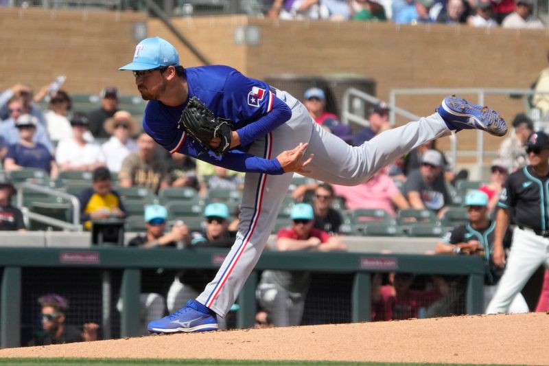 Feb 27, 2024; Salt River Pima-Maricopa, Arizona, USA; Texas Rangers starting pitcher Dane Dunning (33) throws against the Arizona Diamondbacks during the first inning at Salt River Fields at Talking Stick. Mandatory Credit: Rick Scuteri-USA TODAY Sports