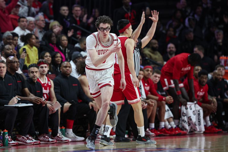 Jan 17, 2024; Piscataway, New Jersey, USA; Rutgers Scarlet Knights guard Gavin Griffiths (10) reacts after a three point basket against the Nebraska Cornhuskers  during the first half at Jersey Mike's Arena. Mandatory Credit: Vincent Carchietta-USA TODAY Sports