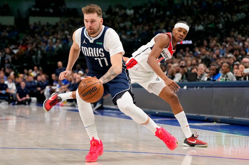 DALLAS, TEXAS - FEBRUARY 12: Luka Doncic #77 of the Dallas Mavericks controls the ball in front of Bilal Coulibaly #0 of the Washington Wizards during the second half at American Airlines Center on February 12, 2024 in Dallas, Texas. NOTE TO USER: User expressly acknowledges and agrees that, by downloading and or using this photograph, User is consenting to the terms and conditions of the Getty Images License Agreement. (Photo by Sam Hodde/Getty Images)