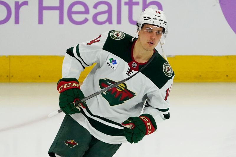Jan 26, 2025; Chicago, Illinois, USA; Minnesota Wild center Joel Eriksson Ek (14) warms up before a game against the  Chicago Blackhawks at United Center. Mandatory Credit: David Banks-Imagn Images