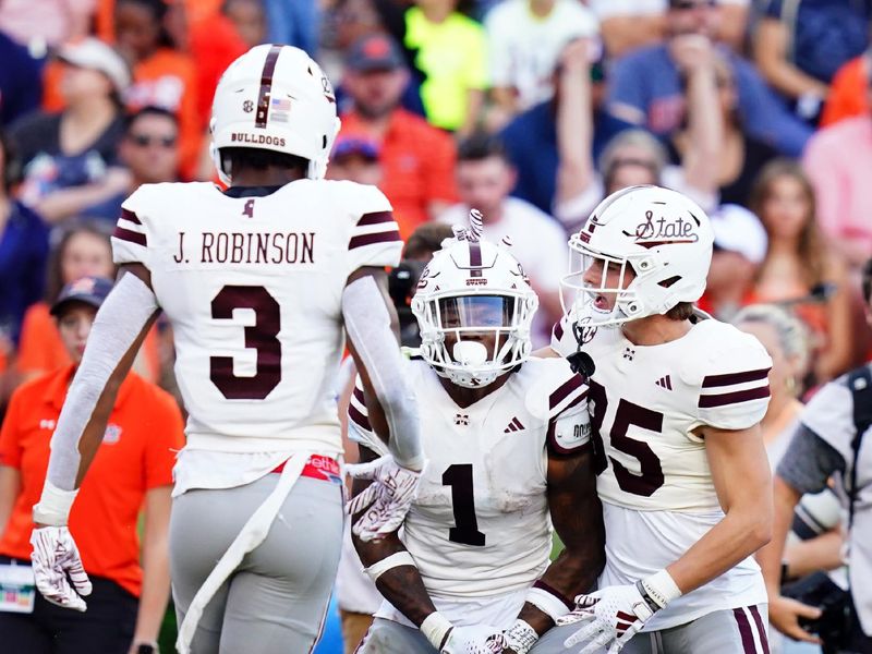 Oct 28, 2023; Auburn, Alabama, USA; Mississippi State Bulldogs wide receiver Zavion Thomas (1) celebrates his touchdown pass in the end zone against the Auburn Tigers during the fourth quarter at Jordan-Hare Stadium. Mandatory Credit: John David Mercer-USA TODAY Sports