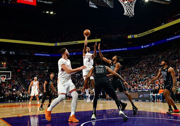 PHOENIX, AZ -DECEMBER 13: Bradley Beal #3 of the Phoenix Suns drives to the basket during the game against the Brooklyn Nets on December 13, 2023 at Footprint Center in Phoenix, Arizona. NOTE TO USER: User expressly acknowledges and agrees that, by downloading and or using this photograph, user is consenting to the terms and conditions of the Getty Images License Agreement. Mandatory Copyright Notice: Copyright 2023 NBAE (Photo by Kate Frese/NBAE via Getty Images)