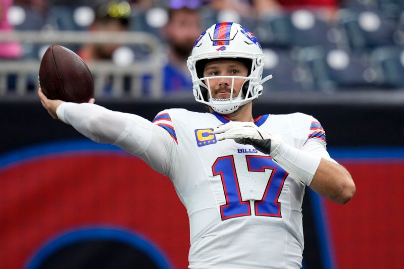 Buffalo Bills quarterback Josh Allen warms up before an NFL football game against the Houston Texans, Sunday, Oct. 6, 2024, in Houston. (AP Photo/Eric Gay)