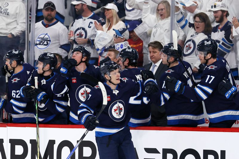 Apr 21, 2024; Winnipeg, Manitoba, CAN; Winnipeg Jets center Vladislav Namestnikov (7) celebrates his first period goal against the Colorado Avalanche in game one of the first round of the 2024 Stanley Cup Playoffs at Canada Life Centre. Mandatory Credit: James Carey Lauder-USA TODAY Sports