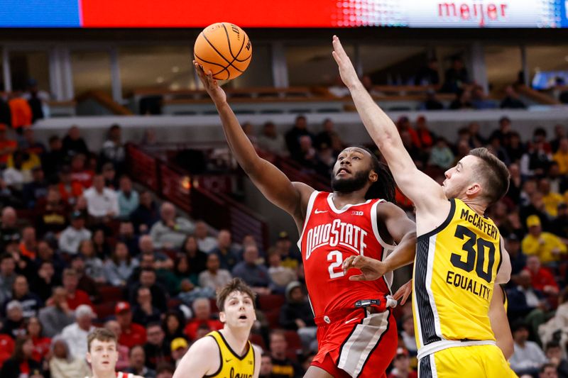 Mar 9, 2023; Chicago, IL, USA; Ohio State Buckeyes guard Bruce Thornton (2) goes to the basket against Iowa Hawkeyes guard Connor McCaffery (30) during the first half at United Center. Mandatory Credit: Kamil Krzaczynski-USA TODAY Sports