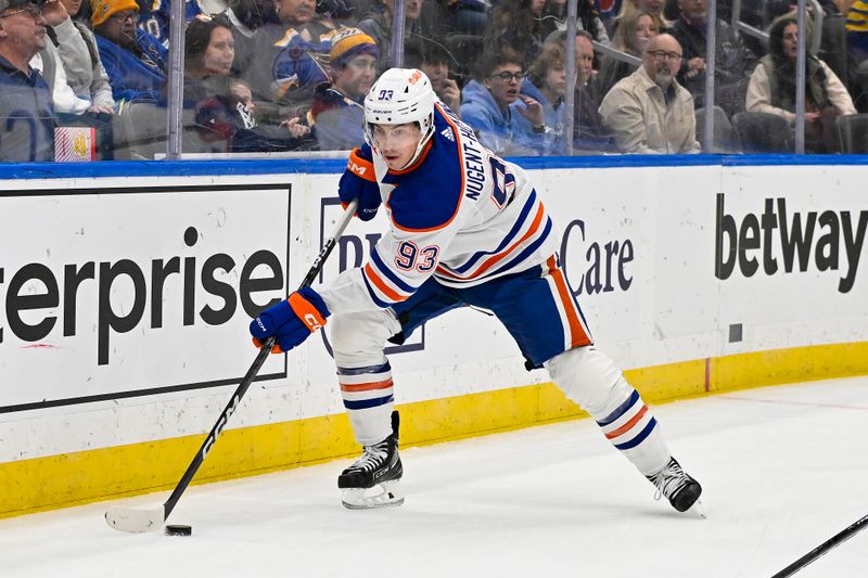 Feb 15, 2024; St. Louis, Missouri, USA;  Edmonton Oilers center Ryan Nugent-Hopkins (93) controls the puck against the St. Louis Blues during the first period at Enterprise Center. Mandatory Credit: Jeff Curry-USA TODAY Sports