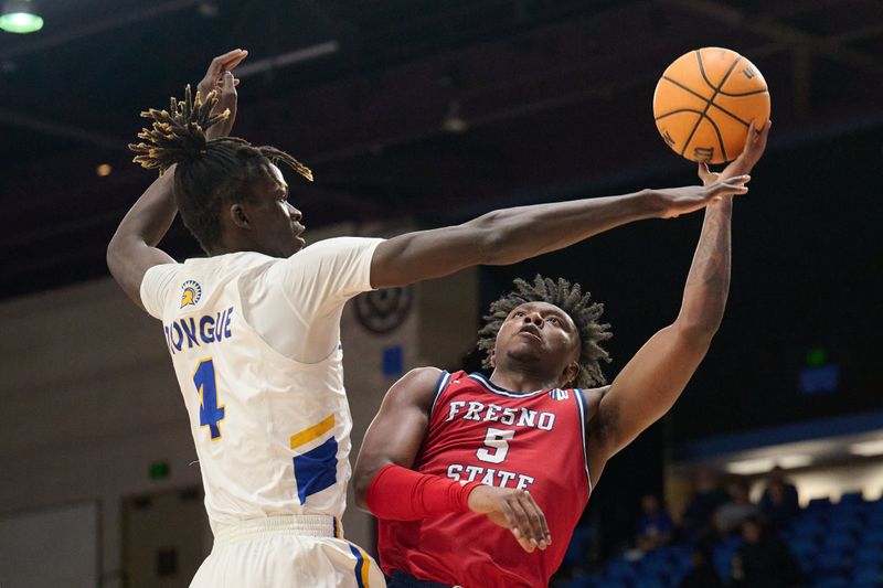 Feb 6, 2024; San Jose, California, USA; Fresno State Bulldogs guard Jalen Weaver (5) shoots the ball against San Jose State Spartans center Adrame Diongue (4) during the first half at Provident Credit Union Event Center. Mandatory Credit: Robert Edwards-USA TODAY Sports