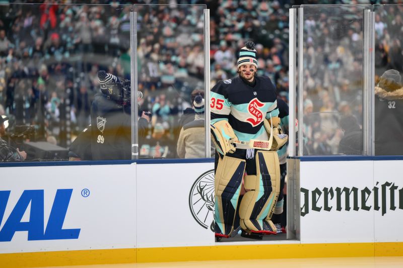 Jan 1, 2024; Seattle, Washington, USA; Seattle Kraken goaltender Joey Daccord (35) enters the ice prior to the game against the Vegas Golden Knights in the 2024 Winter Classic ice hockey game at T-Mobile Park. Mandatory Credit: Steven Bisig-USA TODAY Sports