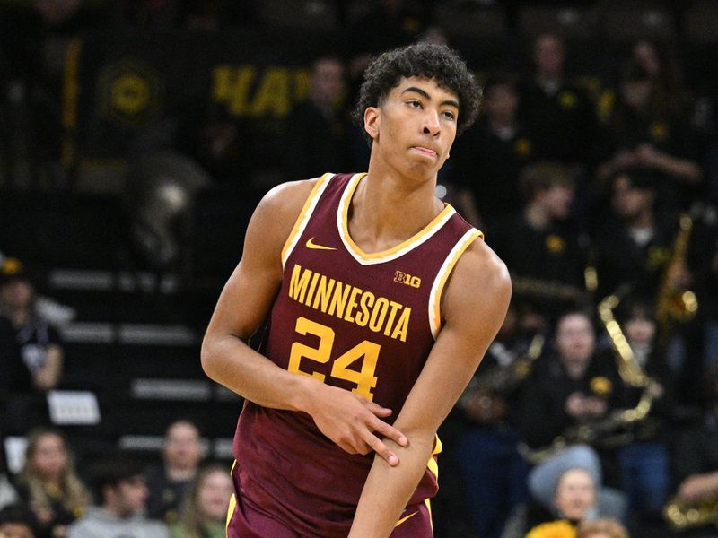 Feb 11, 2024; Iowa City, Iowa, USA; Minnesota Golden Gophers guard Braeden Carrington (4) reacts after a three point basket against the Iowa Hawkeyes during the second half at Carver-Hawkeye Arena. Mandatory Credit: Jeffrey Becker-USA TODAY Sports