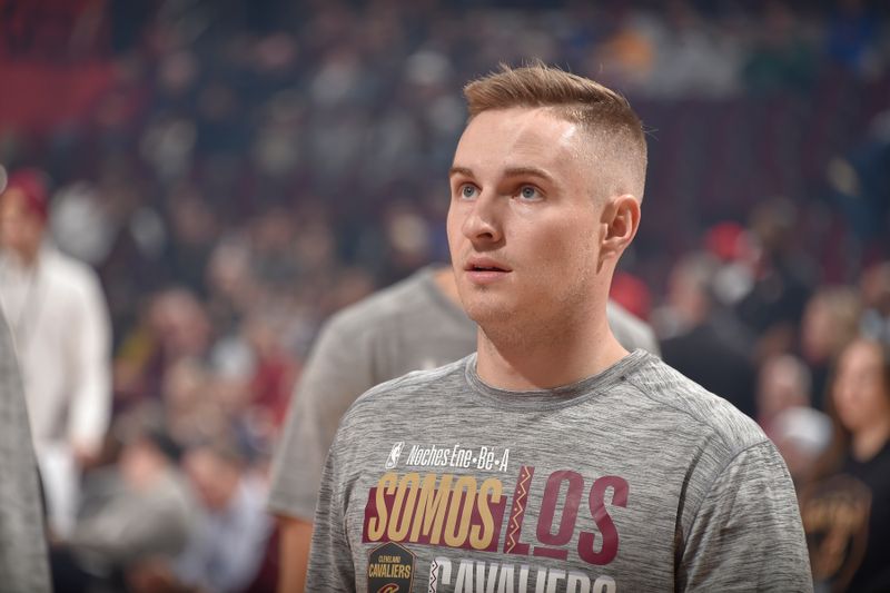 CLEVELAND, OH - MARCH 11:  Sam Merrill #5 of the Cleveland Cavaliers looks on before the game against the Phoenix Suns on March 11, 2024 at Rocket Mortgage FieldHouse in Cleveland, Ohio. NOTE TO USER: User expressly acknowledges and agrees that, by downloading and/or using this Photograph, user is consenting to the terms and conditions of the Getty Images License Agreement. Mandatory Copyright Notice: Copyright 2024 NBAE (Photo by David Liam Kyle/NBAE via Getty Images)